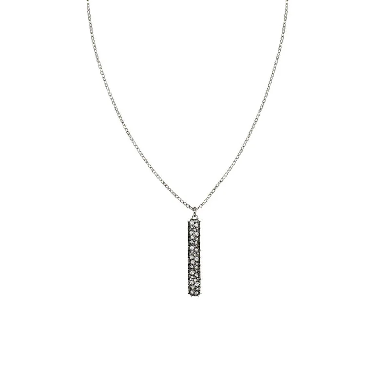 18 Karat White Gold Confetti long tag pendant with Black Rhodium and White Diamonds