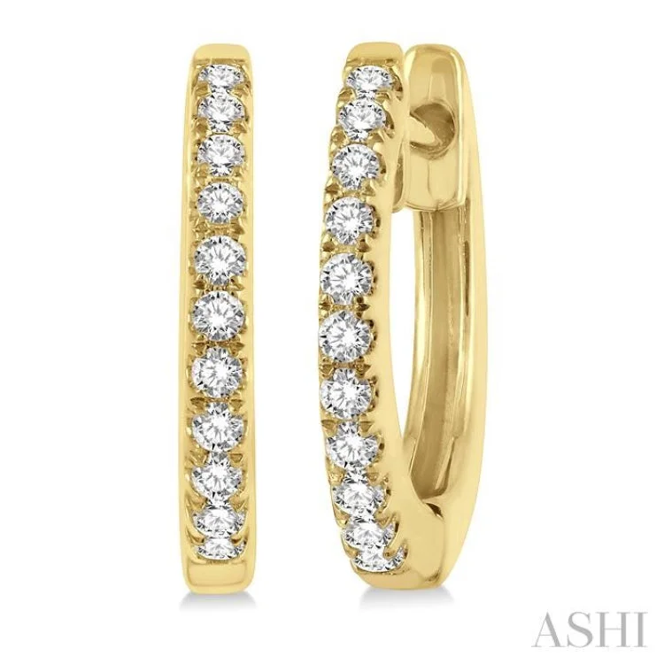 1/6 ctw Round Cut Diamond Petite Fashion Huggie Earrings in 14K Yellow Gold